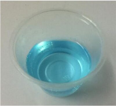 An aqueous solution of chlorhexidine gluconate