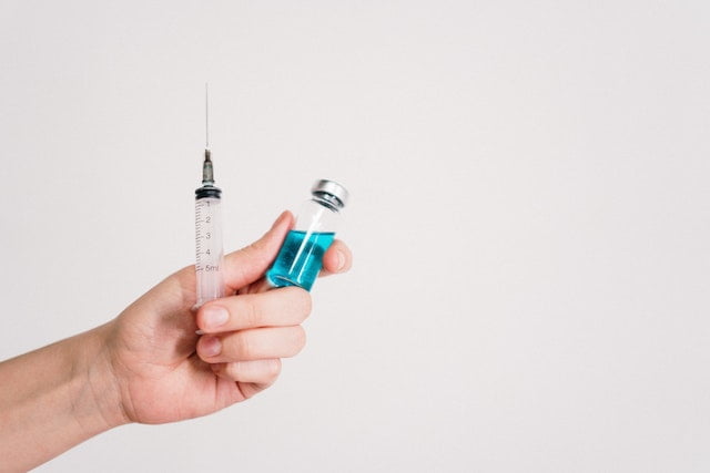 An injection along with a vial