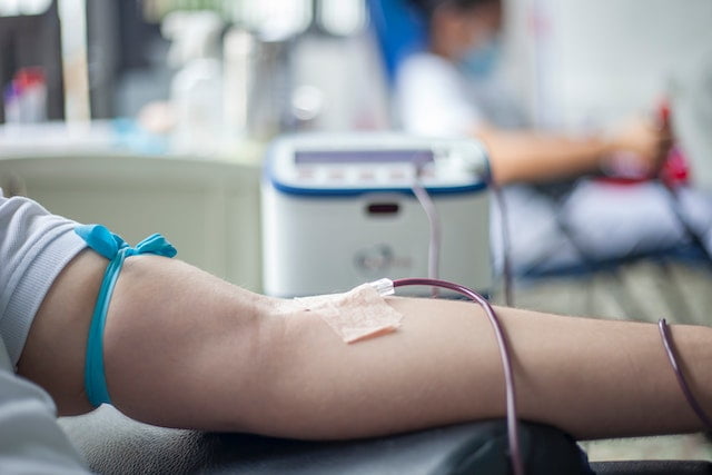 IV set employed in a person’s veins while blood donation