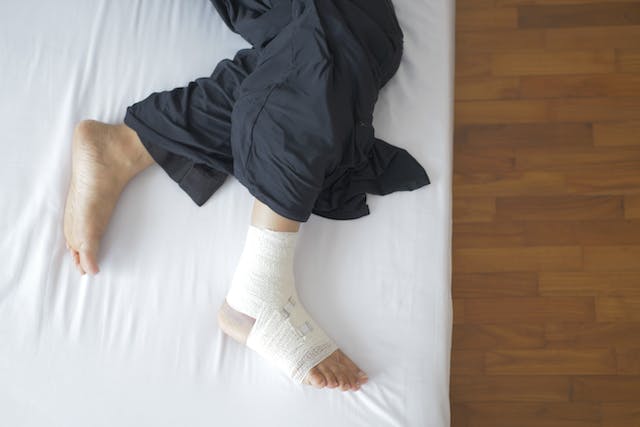 Foot covered in a bandage to recover a foot injury