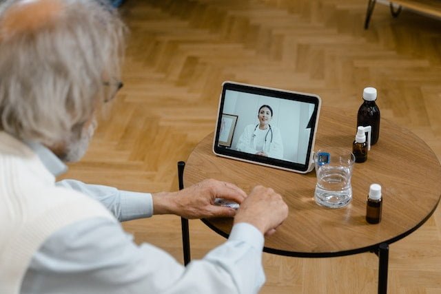 A patient consulting a physician through an online platform