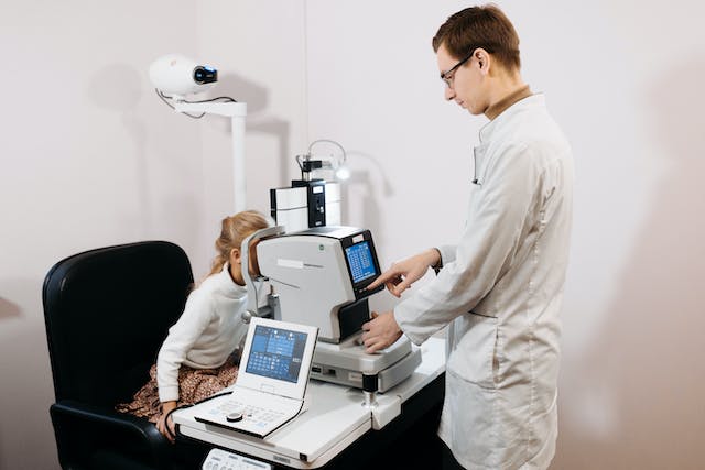 An eye examination is undergone by a pediatric patient to diagnose lazy eye disease