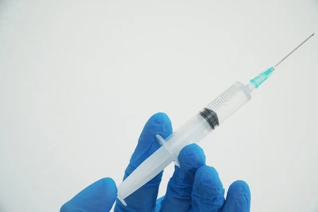 Oral syringe being filled before use in a patient