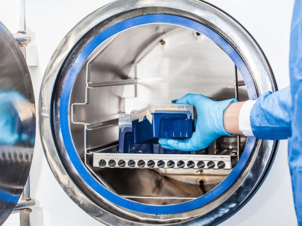 Samples are being put in an autoclave for sterilization