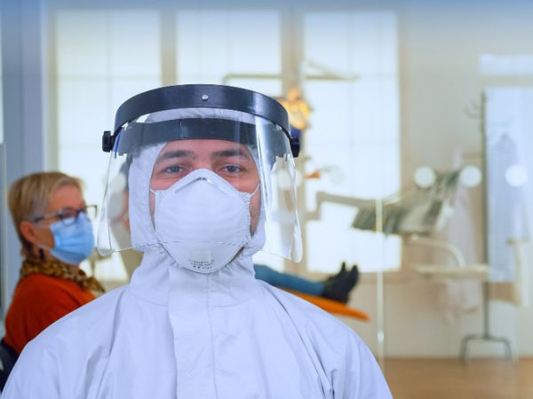 Physicians should wear face shields along with masks, gowns, and gloves